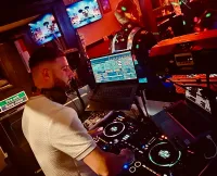 Shaun DJing in a pub
